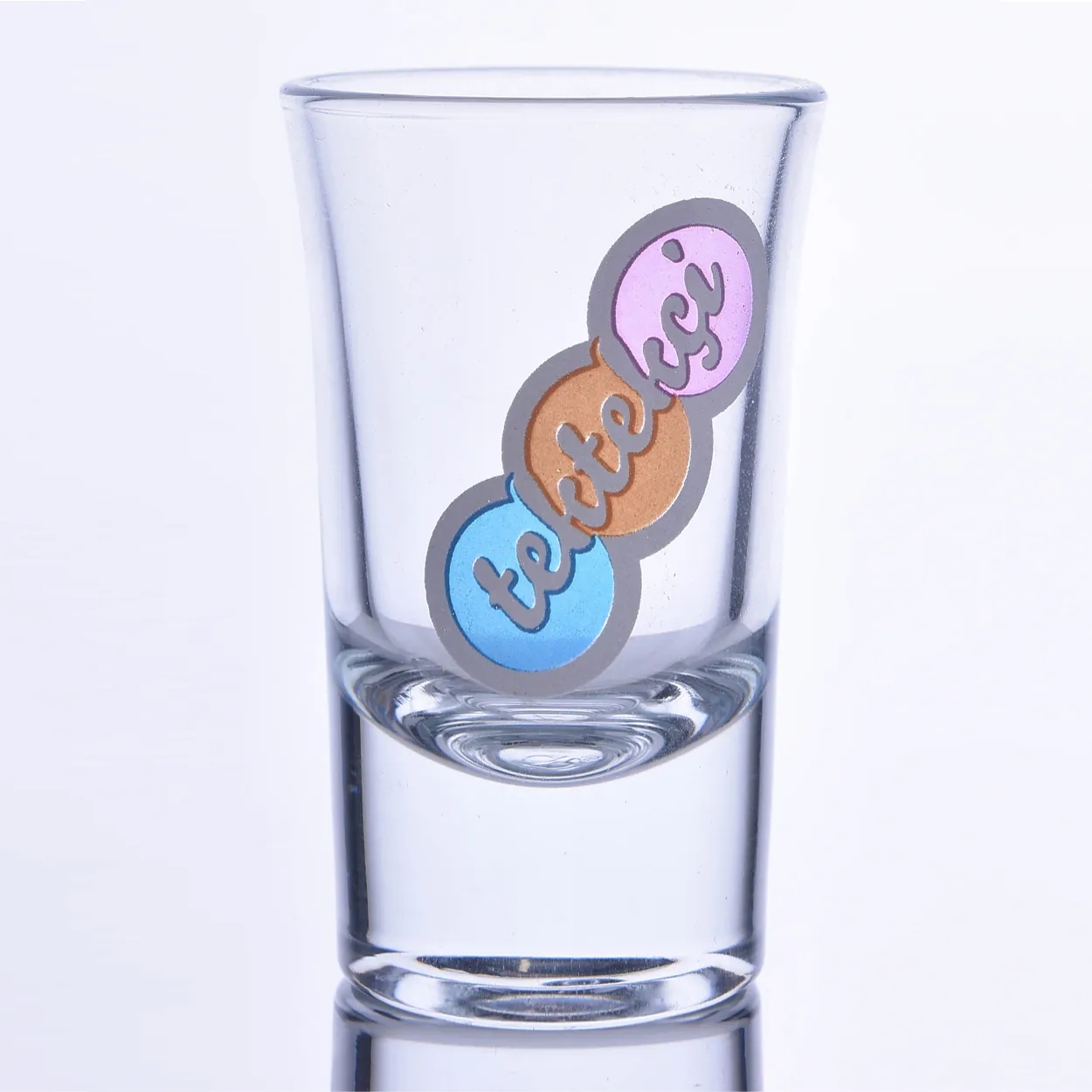 Shot glass printed with pastel-colored circles and text — Model 1003c
