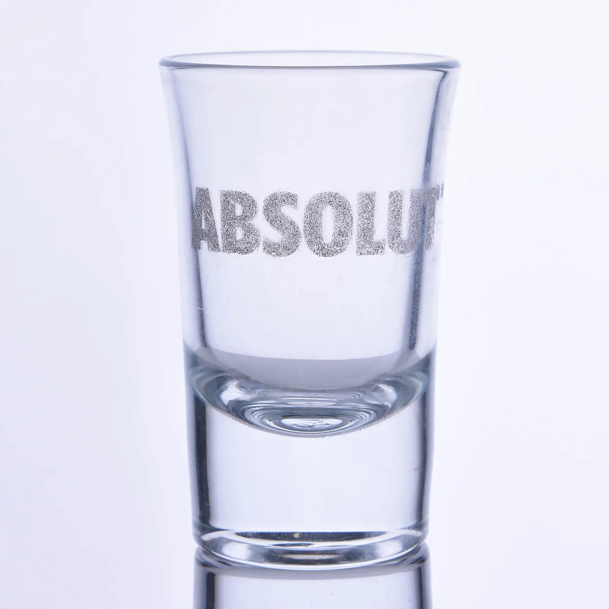 Silver-colored textured text-printed shot glass — Model 1003c