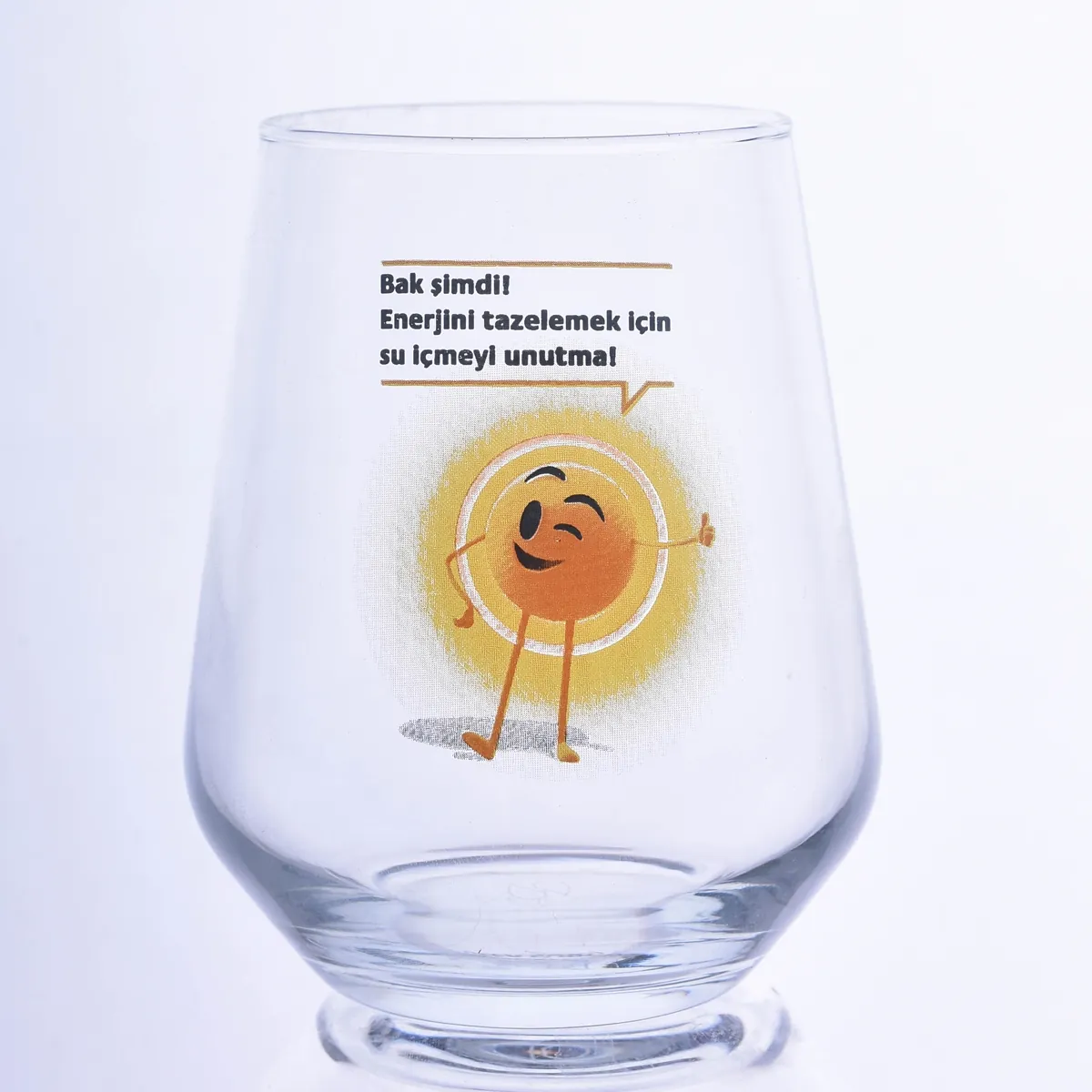 Water glass printed with orange sun character and text — Model 1004c